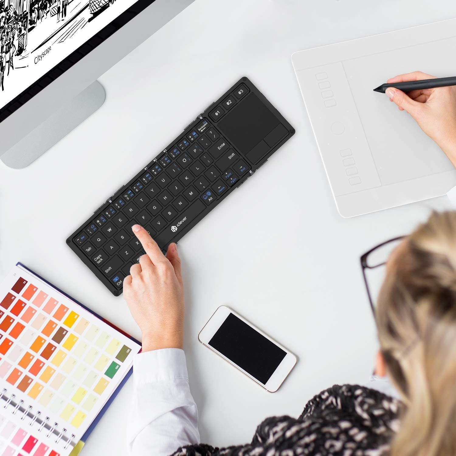 Transform Your Productivity with the Iclever BK08 Foldable Bluetooth Keyboard & Touchpad - Ultimate Portability for Professionals!